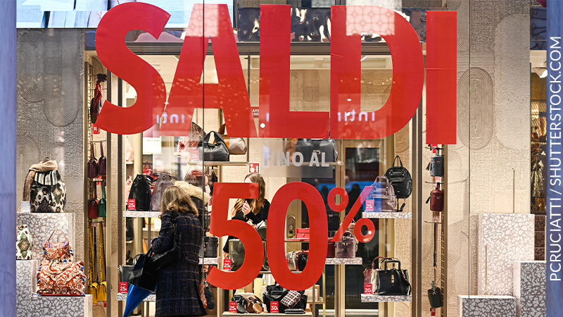 Vetrina di un negozio con percentuali di sconto